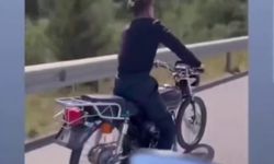 Otobanda motorun üzerine uzanarak ölüme yarış pahalıya patladı
