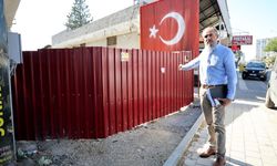 "Tapulu arazim" dedi, sokağın girişini kapattı