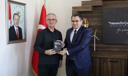 İşbilen’den Kaymakam Balaban’a Kitap Takdimi