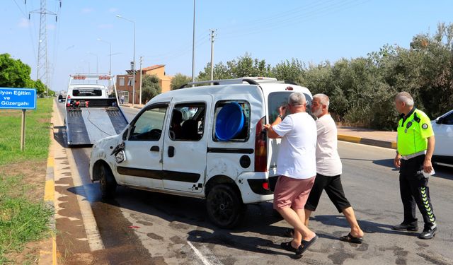 Yan yatıp sürüklenen araçtan yara almadan çıktılar