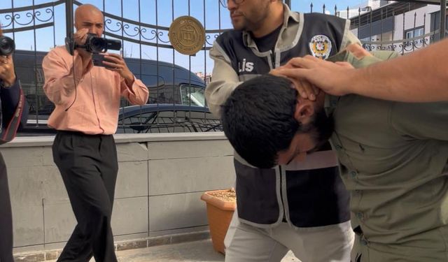Eşini sokak ortasından döven şahıs adliyeye sevk edildi
