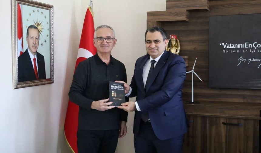 İşbilen’den Kaymakam Balaban’a Kitap Takdimi